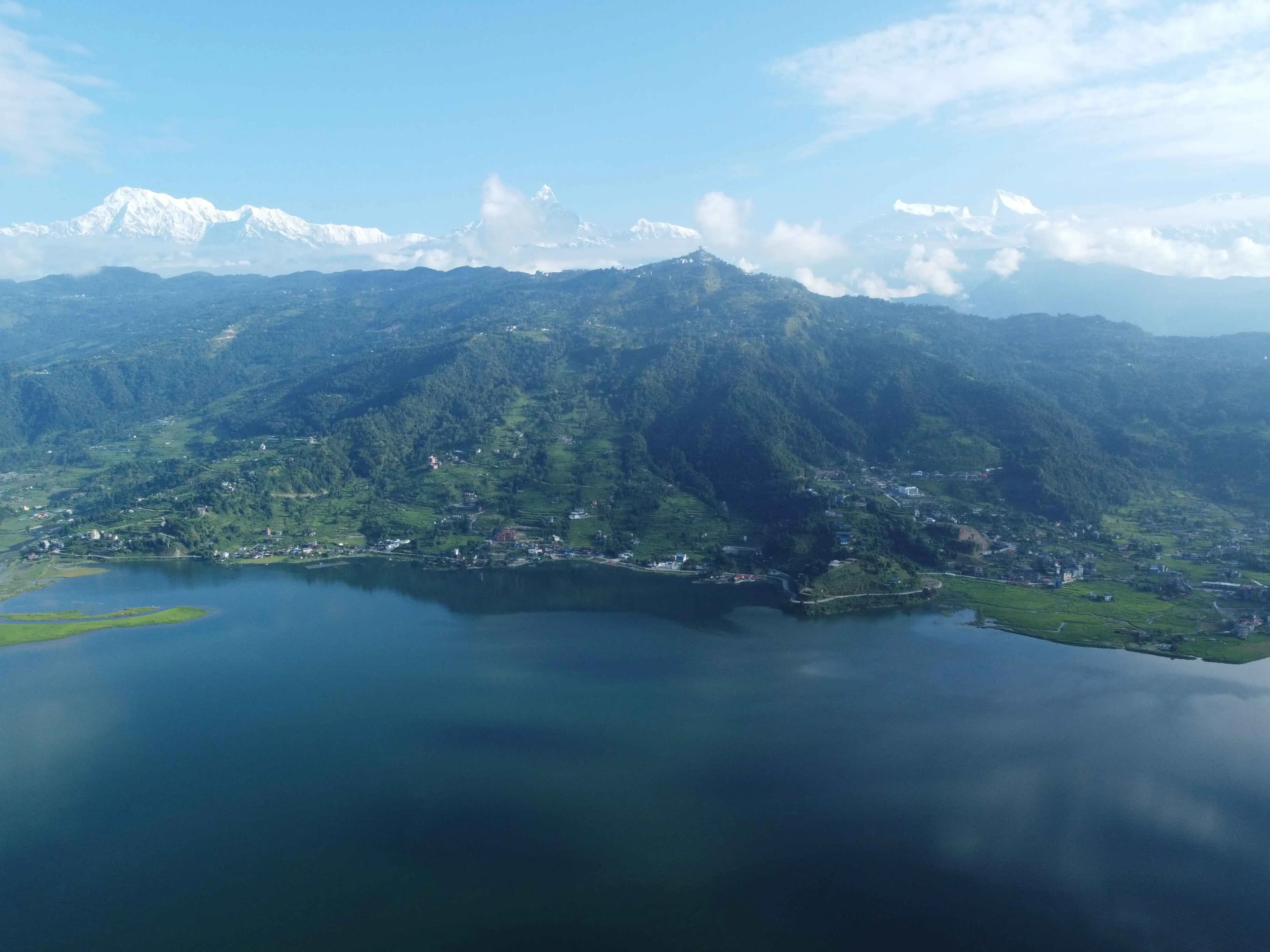 Fewa lake and green hills